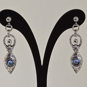 Female figure earrings